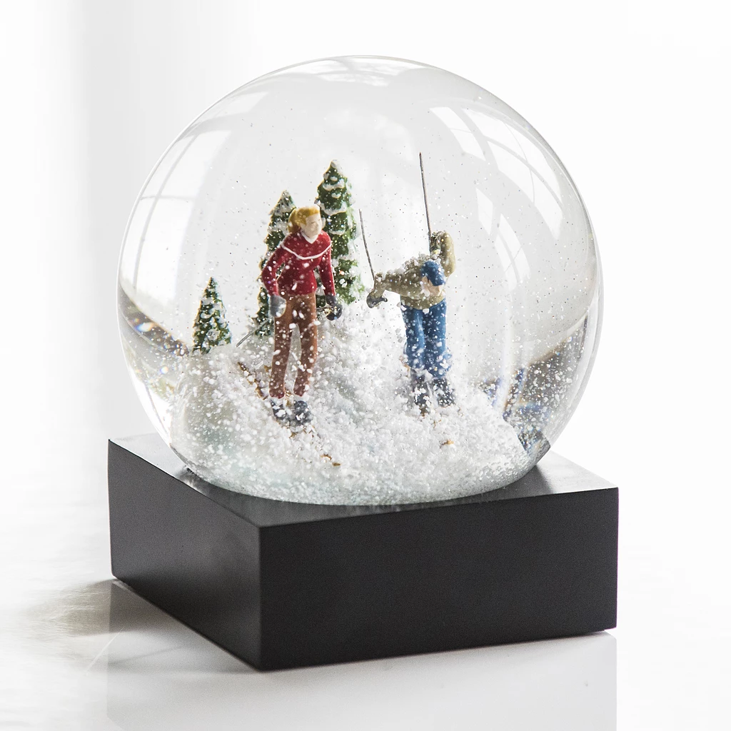 Schneekugel Skifahrer